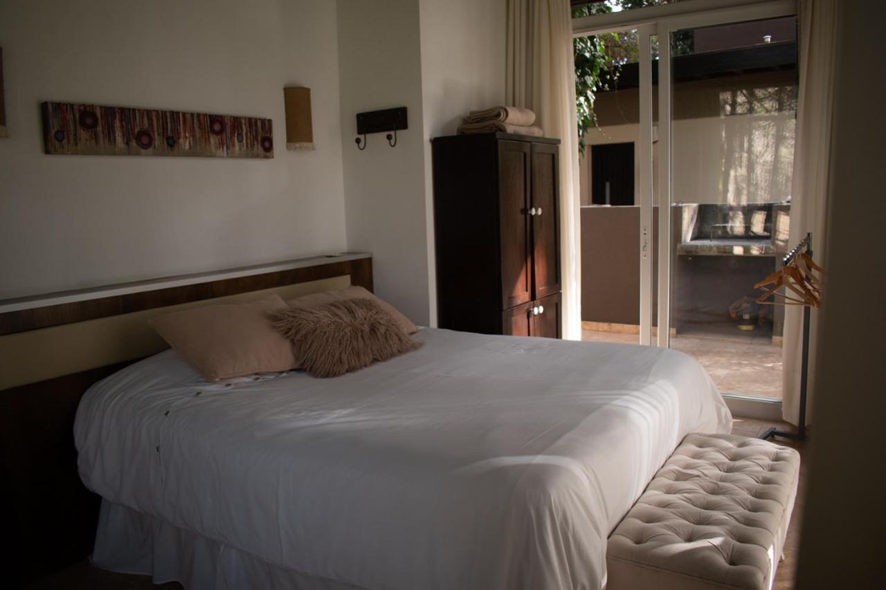Aparthotel Sonidos Del Bosque à Mar de Las Pampas Extérieur photo